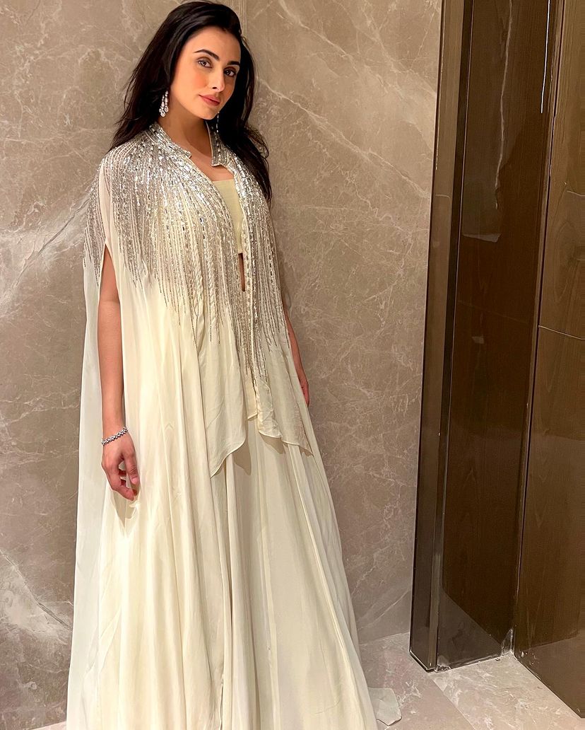 Anna Malhotra in Ivory Cape Lehenga