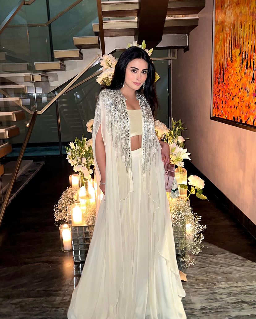 Anna Malhotra in Ivory Cape Lehenga