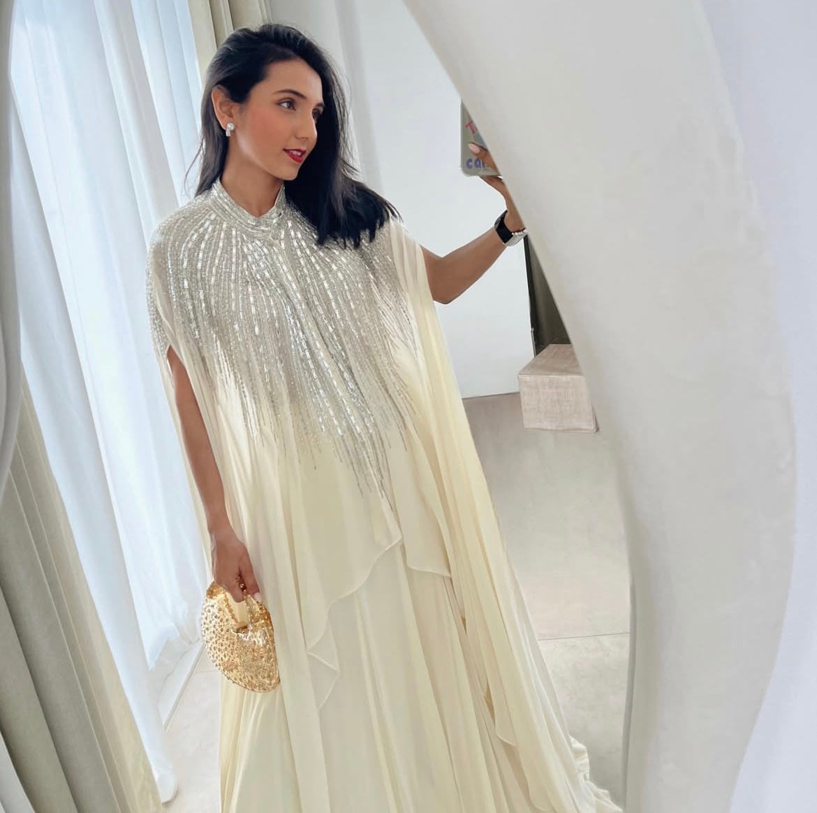 Massoom Minawala in Ivory Cape Lehenga Set