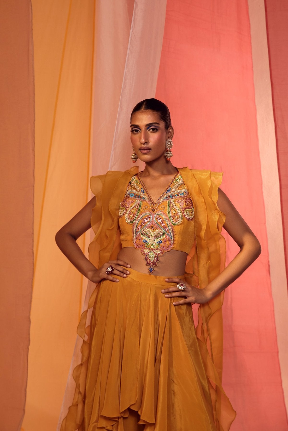 MUSTARD RUFFLE CAPE WITH EMBROIDERED NECK DETAIL BLOUSE AND DRAPE PANTS