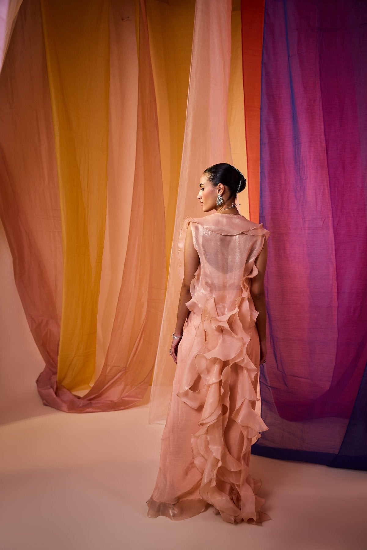 PEACH SEQUENCE EMBROIDERED BLOUSE WITH DRAPE SKIRT AND DRAMATIC RUFFLE CAPE