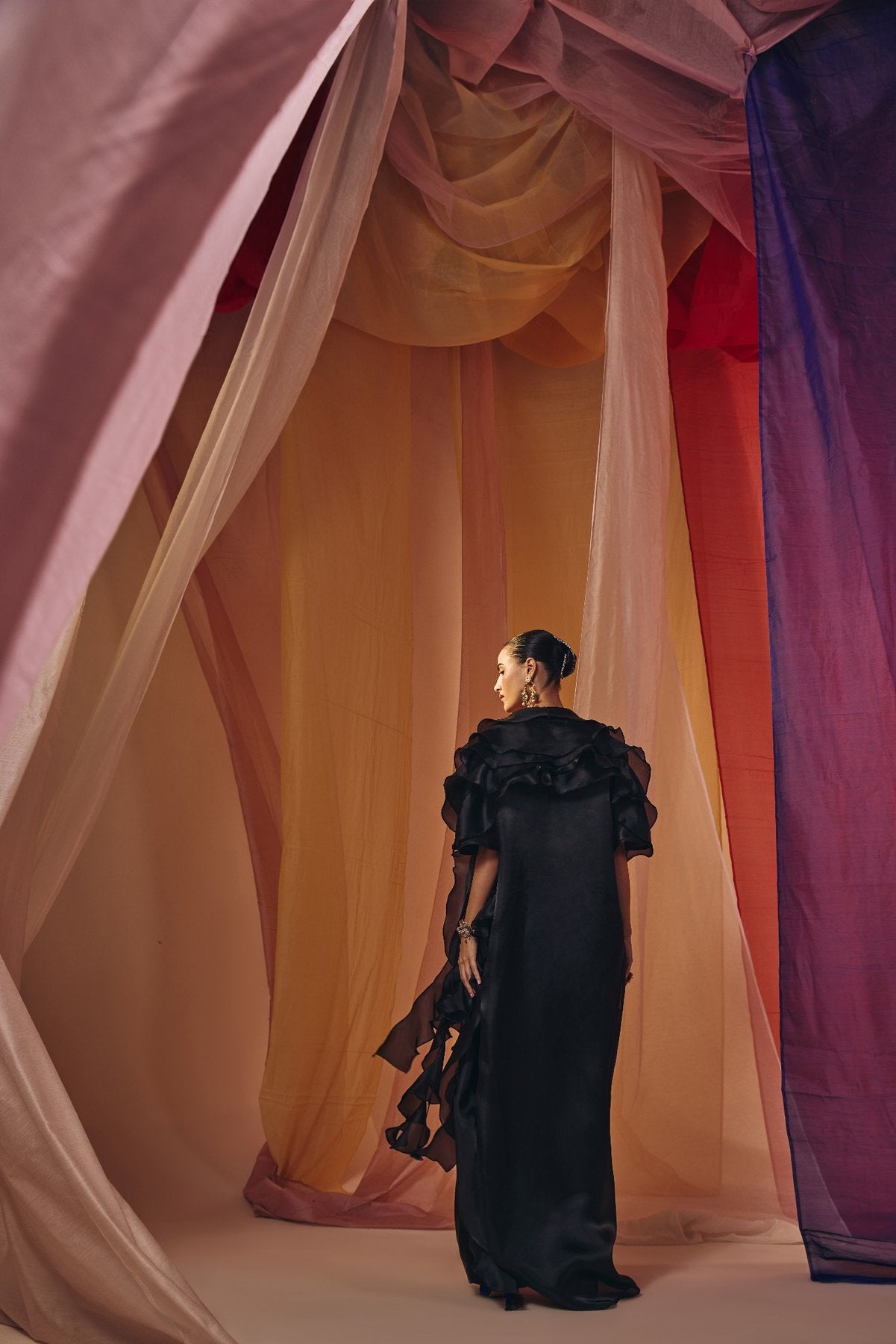 BLACK RUFFLE CAPE WITH EMBROIDERED NECK DETAIL BLOUSE AND DRAPE SKIRT