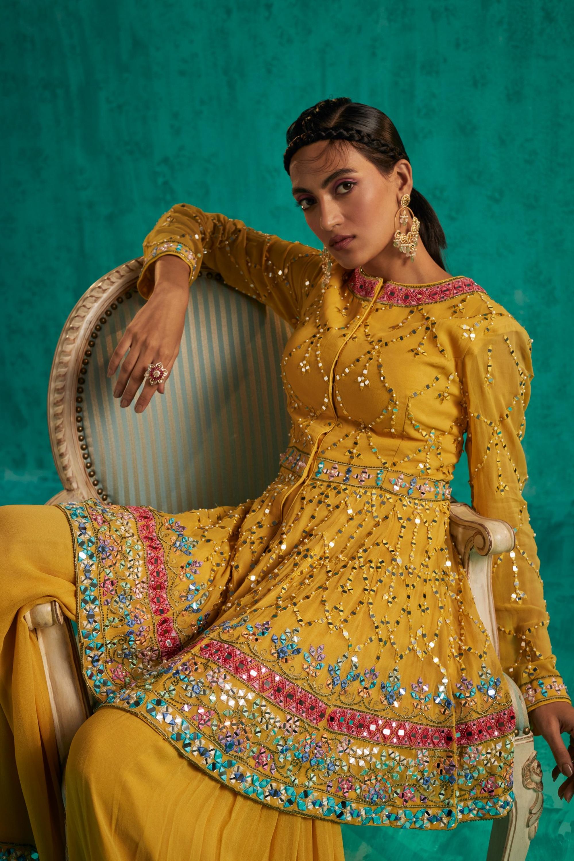 TRADITIONAL SHARARA WITH A MODERN PEPLUM KURTA FINELY EMBELLISHED WITH PATRA AND PEARL EMBROIDERY - S307