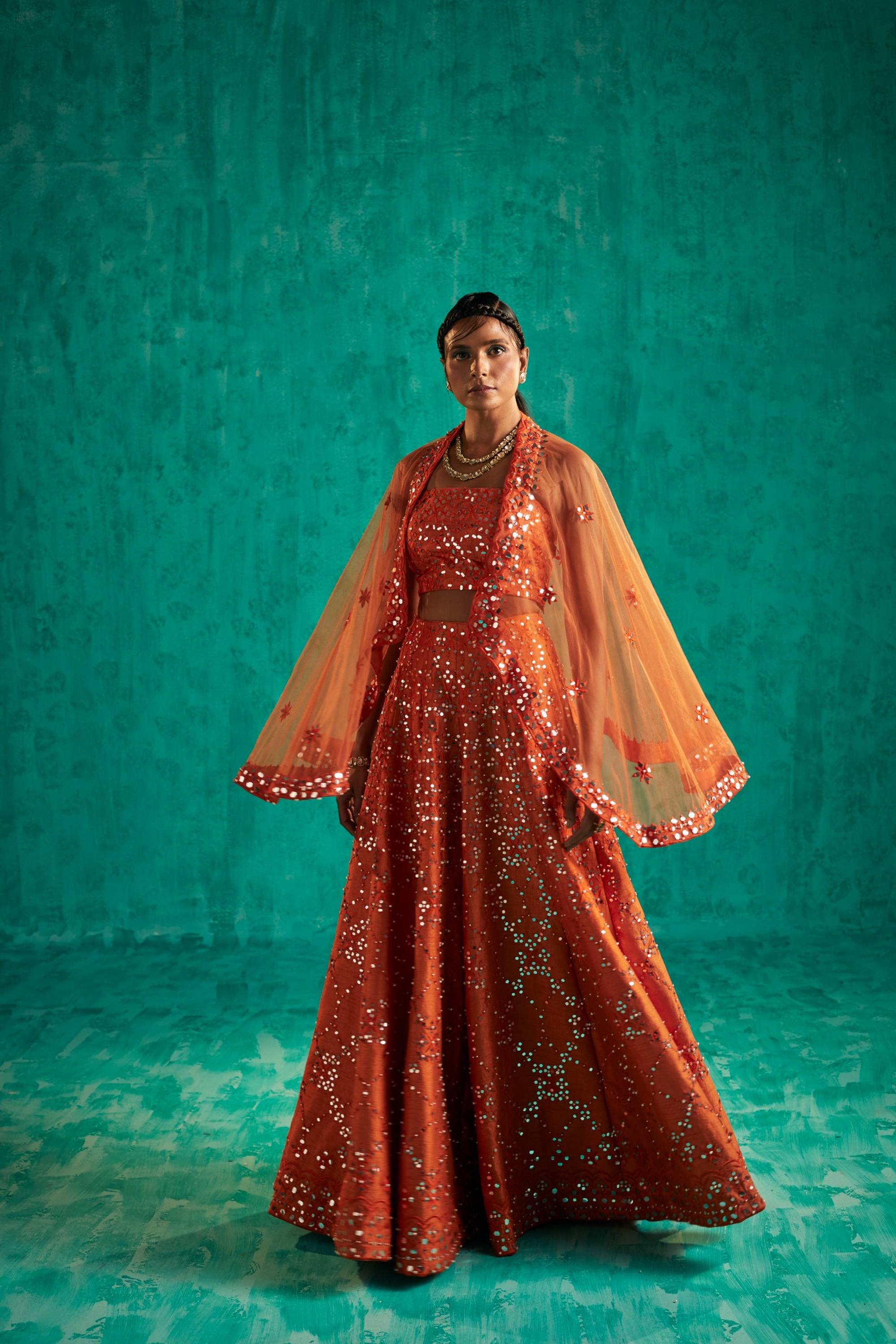 INTRICATE PATRA AND PEARL JAAL EMBELLISHED SHARARA AND BLOUSE WITH A QUIRKY NET CAPE - S193