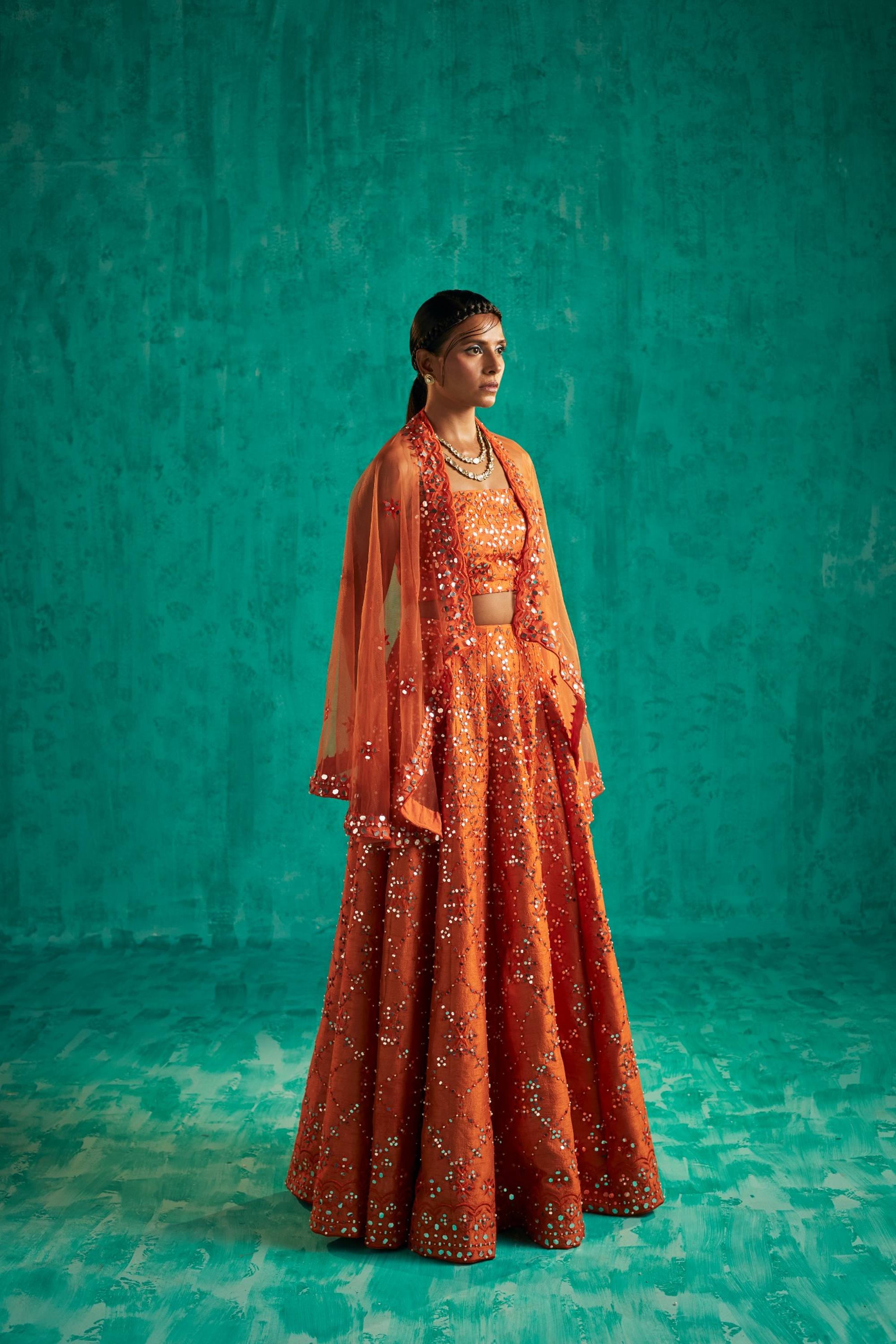 INTRICATE PATRA AND PEARL JAAL EMBELLISHED SHARARA AND BLOUSE WITH A QUIRKY NET CAPE - S193
