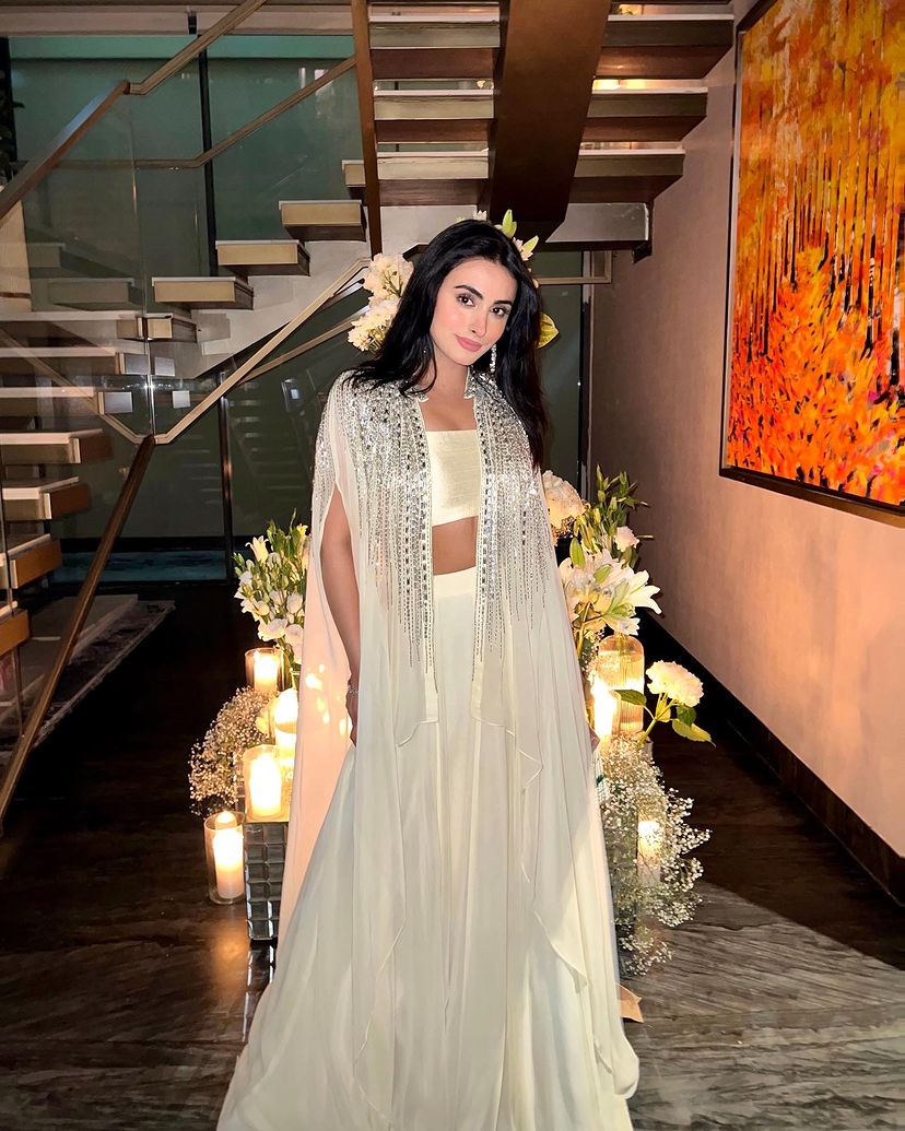 Anna Malhotra in Ivory Cape Lehenga