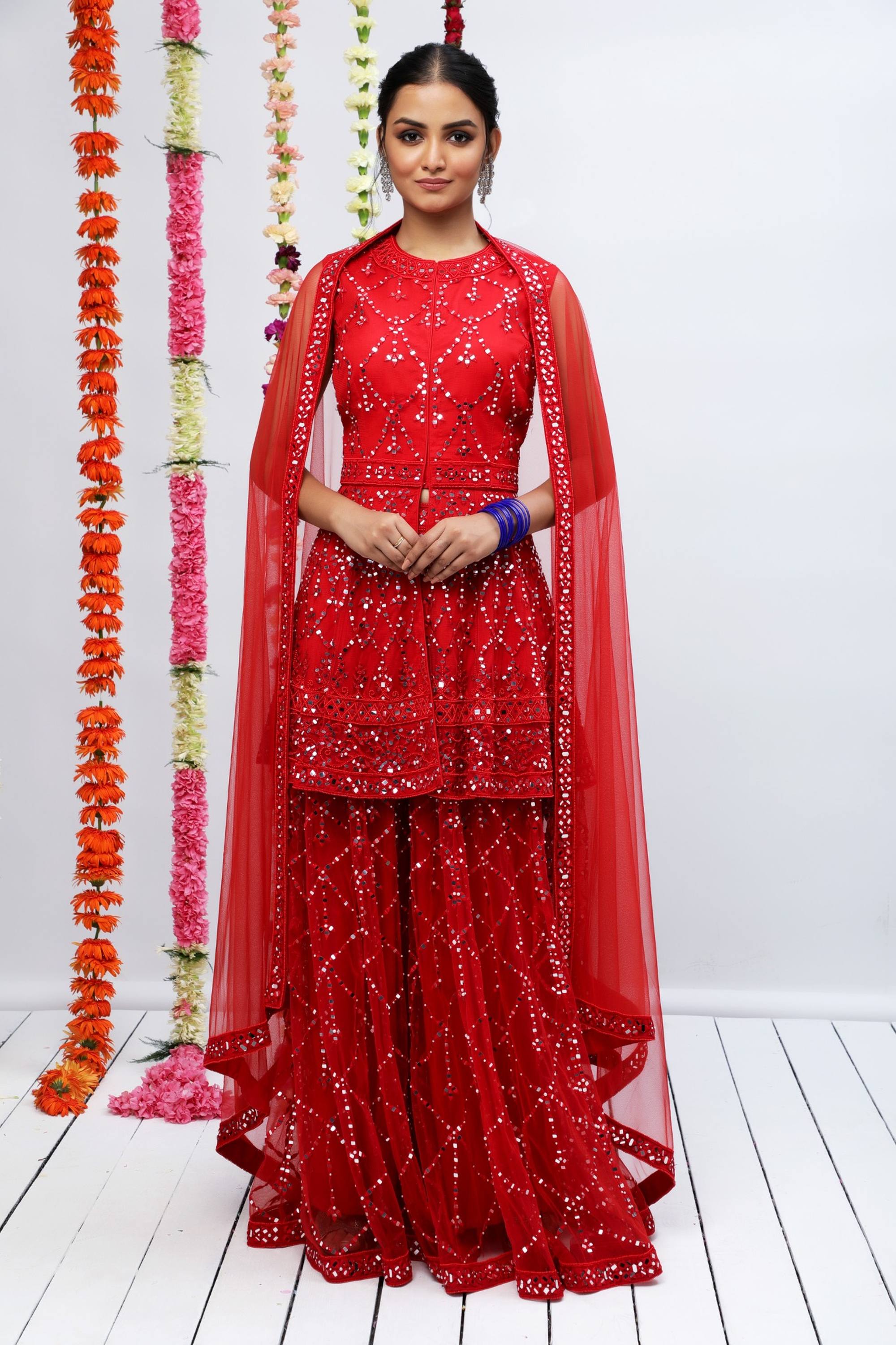 TRADITIONAL SHARARA WITH A MODERN PEPLUM KURTA FINELY EMBELLISHED WITH PATRA AND PEARL EMBROIDERY - S189